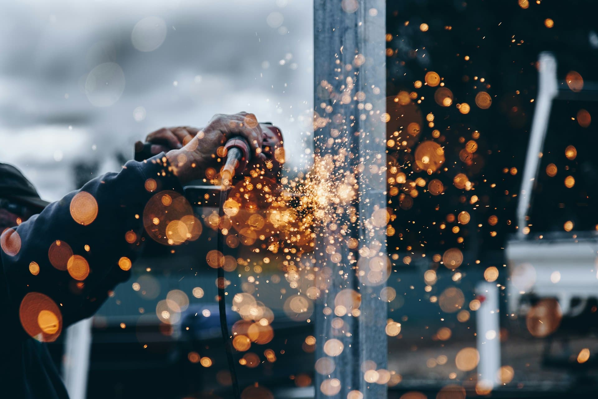 Sparks flying during precision metal fabrication